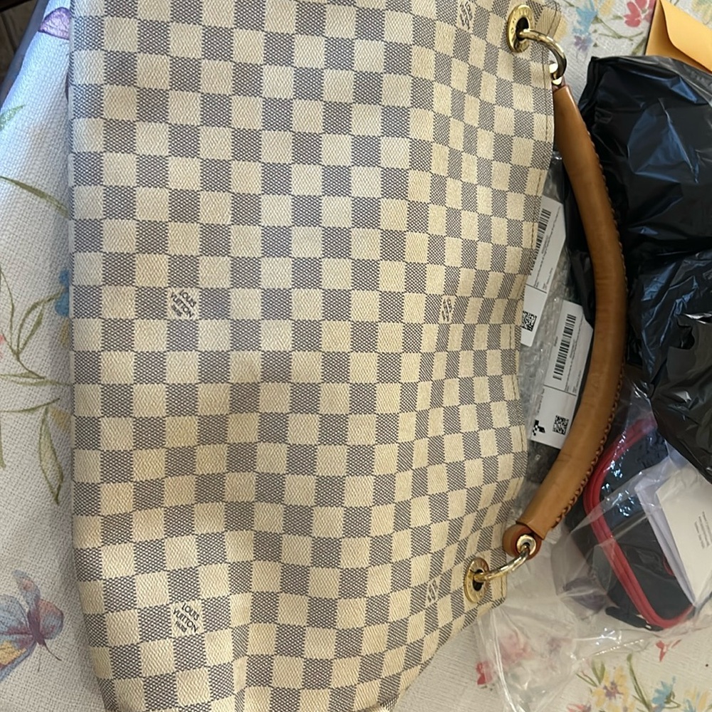 Louis Vuitton great shape many different pockets, blue and white